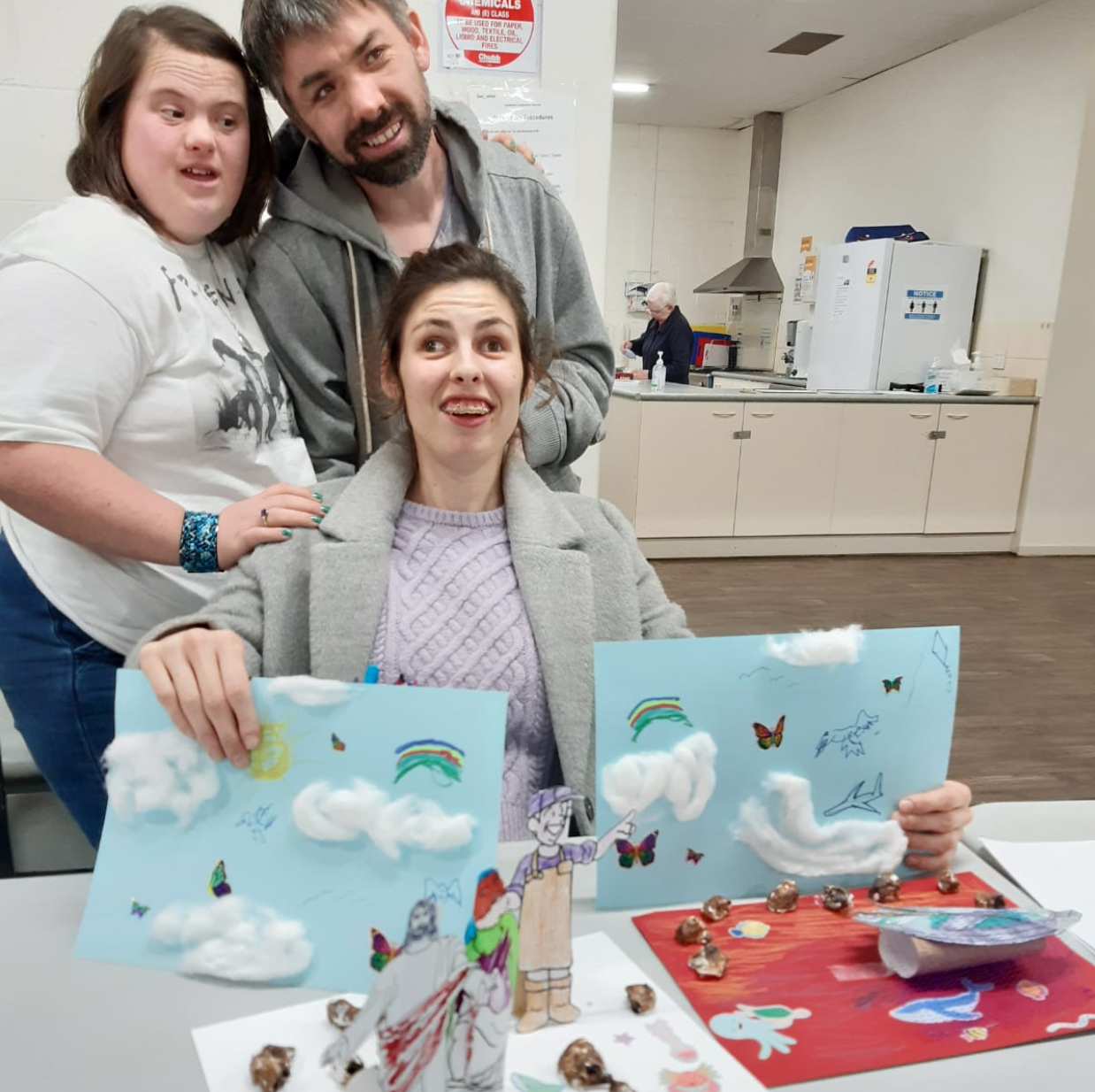 Jesus Club Albury - a program for adults with intellectual disabilities. Picture shows Jesus Club Albury members looking so proud with their completed craft.